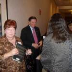 Congressman Tom DeLay signing books